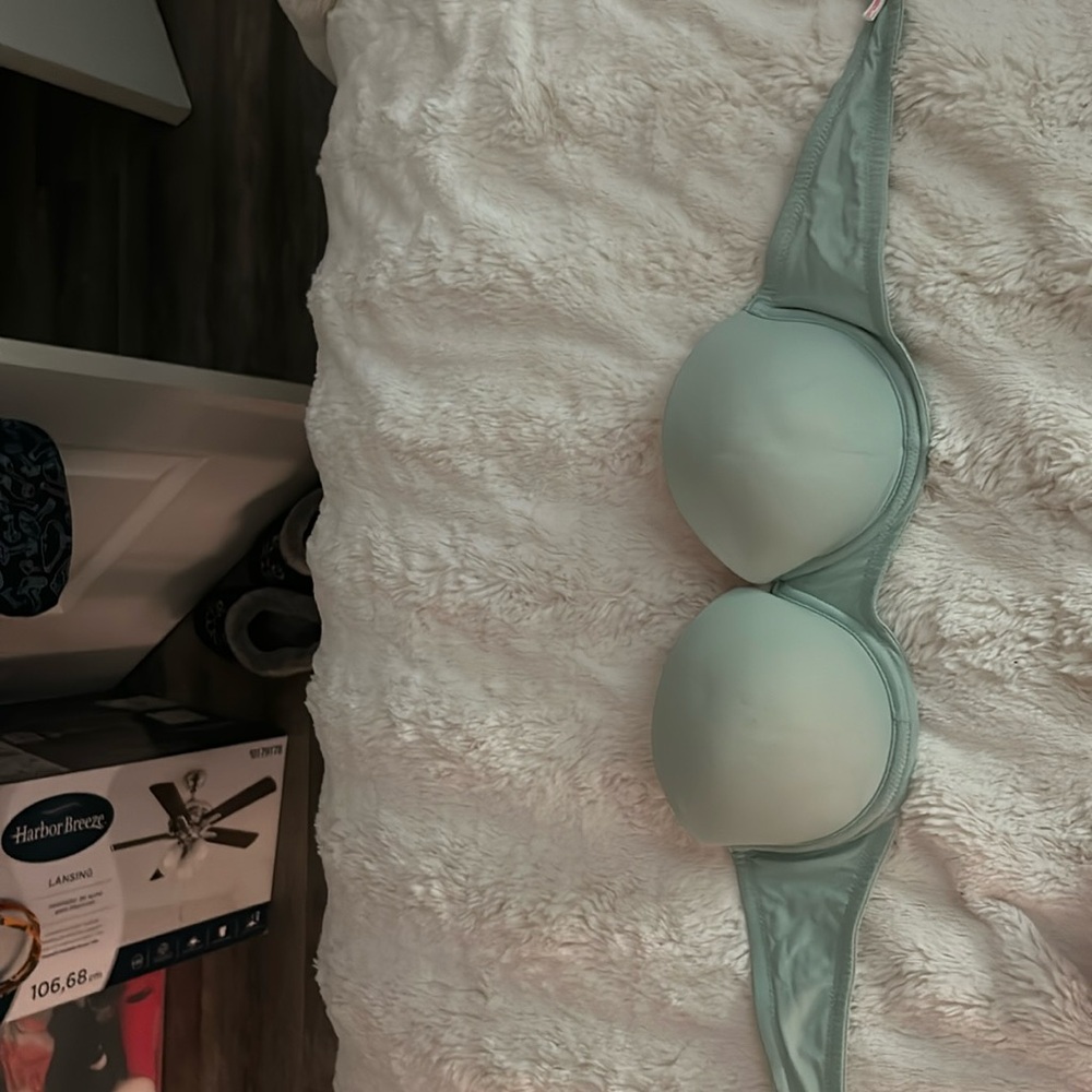 PINK, light blue strapless bra.